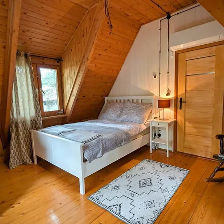 Holiday home Szumiaca Sosna - Jacuzzi, Ognisko, Sauna, Bbq *